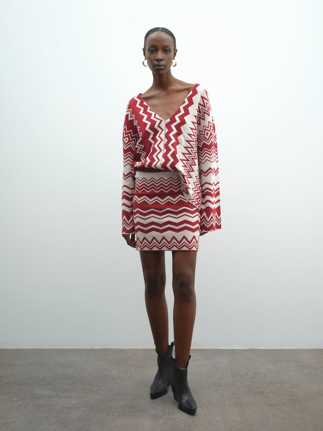 Maglia AKEP con scollo a "V"